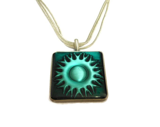 Southwest sun pendant, blue green square, epoxy sun in a pewter frame, silver plated chain, three strand, decorative clasp