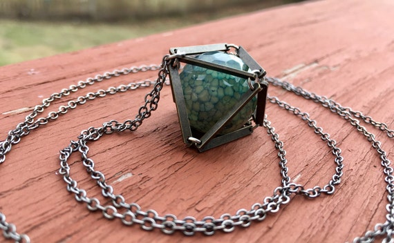 Blue Dragon Veins Caged In Antique Brass Necklace