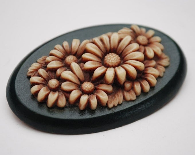 Celluloid Flower Brooch - Creamy Brown early plastic - Green wood - Oval Floral Pin