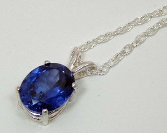 Blue Topaz Necklace. Blue Topaz in Sterling Silver Prong Setting. Facet Blue Topaz 10mm x 8mm