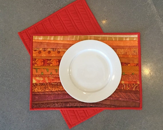 TWO. Quilted rust placemats. Modern home decor. Rust table