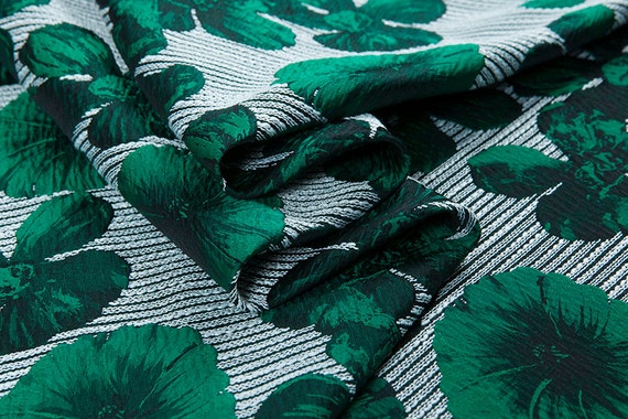 Green yarn-dyed couture fashion fabric, jacquard white, threading, dots ...