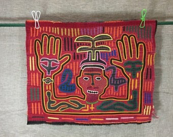 Vintage Panama Kuna mola of man with beanie