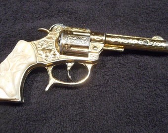 Kilgore gold buck cap gun. 1955-60. Engraved single shot die cast. Hubley, nichols,marx,actoy.lone star, cap guns