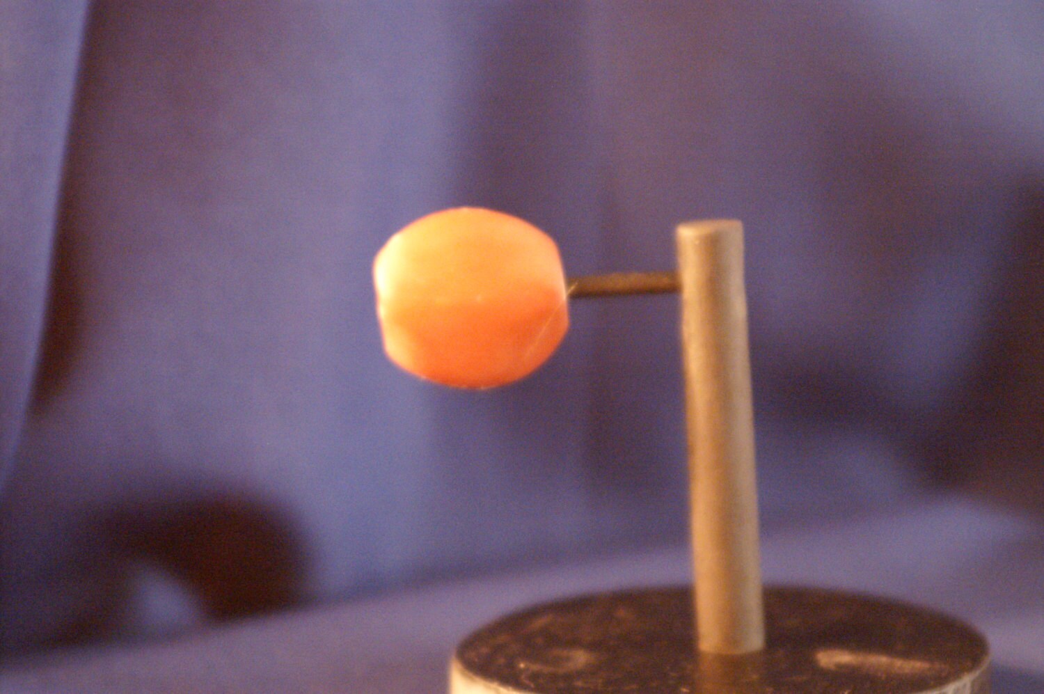 Smoking stone toke one hitter holds hand rolled joints