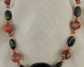Hand strung natural semi-precious gemstone beaded necklace.