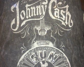 Custom Distressed Band T-Shirts with Swarovski Crystals such as:Chris Stapleton, Lynard Skynard, ACDC, Johnny Cash, Areosmith, Dolly & more