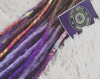 UK Custom made human hair dreadlock extensions. Light brown to lilac and violet