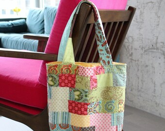 Quilt Pattern Jelly Roll fabric bag by Donna Westerkamp, a jelly roll project to make a bag or purse for school or work. Strip pieced bag