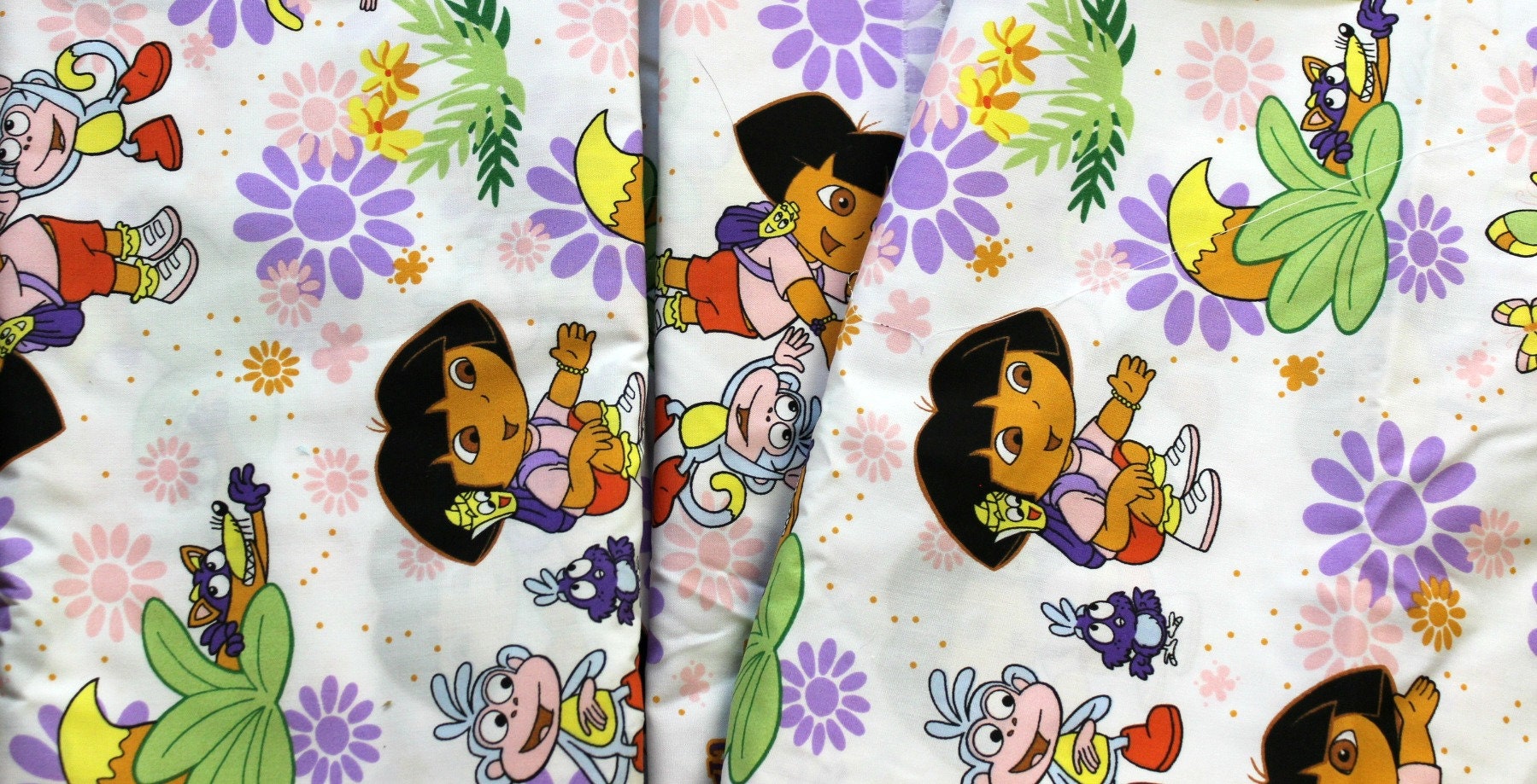 Dora 60" wide 100 cotton fabric from SunshineAnnieFabrics on Etsy Studio