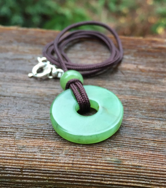 Super High Grade Hand Carved Apple Green Wyoming Jade Pendant