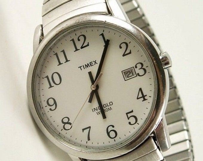 Storewide 25% Off SALE Gentleman's Vintage TIMEX Indiglo Water Resistant Silver Quartz Watch Featuring White Bezel with Date Window Display