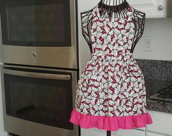 Hello Kitty apron with a cute with or without ruffle, can be made in xsmall, small, medium, large and xlarge.