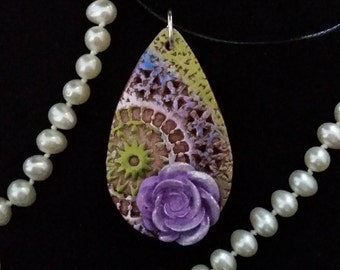 Multi-colored pendant with purple glittered rose. Textured with details on front and back. FREE SHIPPING.