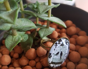 Bague oiseau en cage couleur bronze - Bronze colored ring with bird in cage