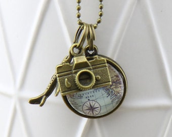 Small World Map Circle Glass Pendant with bronze Plane and camera charms on a Bronze Necklace - Australian Seller