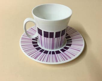 Set of four teacups striking purple design