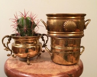 vintage brass plant pots, priced separately, shell and hammered brass, two on the right are still available, with handles, and patina