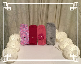 Handmade crochet fingerless gloves in different colours.