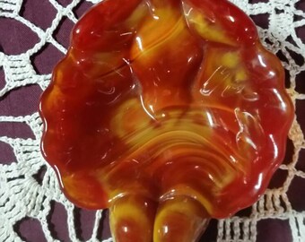 Glass slag dish, ash tray. Orange and red.