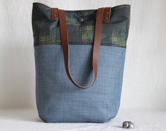 Shoulder bag with leather handles