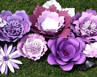 Beautiful and bright giant paper flowers in lavender and purples. #weddings #birthdays #babyshower #bridalshower