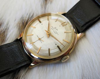Vintage "G.P." signed gold plated watch from the 1960s, manual winding - Montre mécanique vintage signée "G.P." plaquée or des années 1960