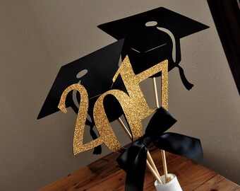 Resultado de imagen para centros de mesa para graduacion