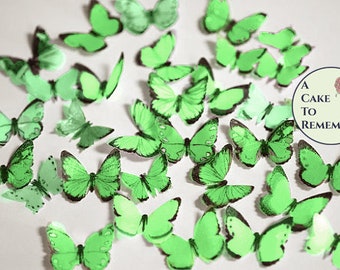 48 small green edible butterflies, 1/2"- 3/4" wide. Multi colors available. For cakes or cupcake toppers, cake pops or smash cake topper