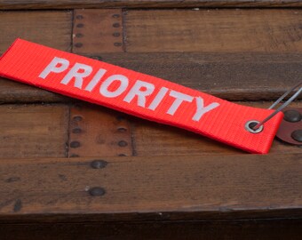 Luggage Tag PRIORITY Double Sided in Lifeboat Orange