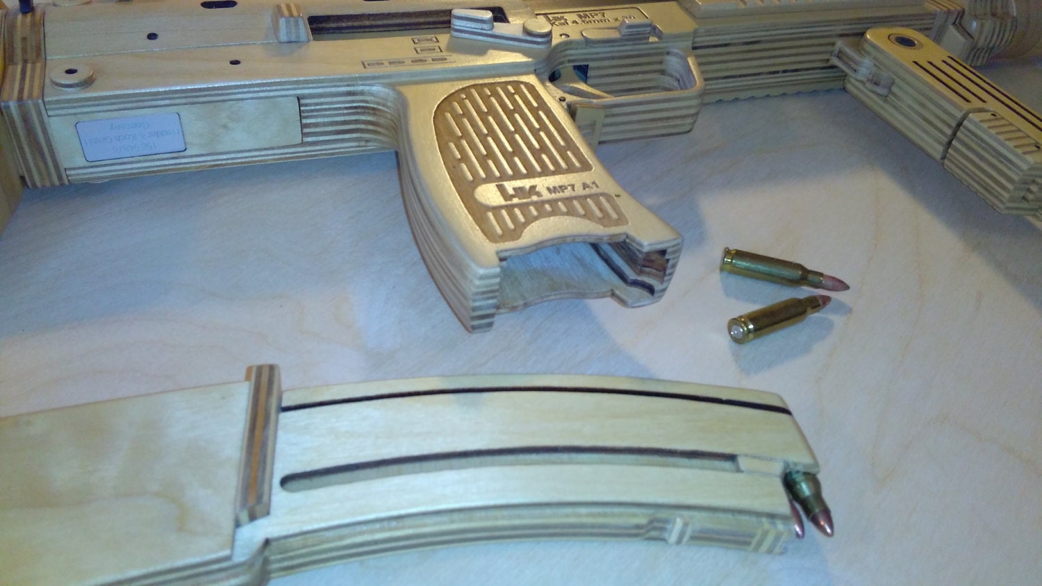 Wooden Heckler & Koch mp7 made out of a tree.