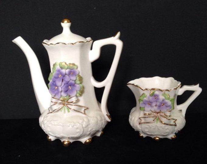 Storewide 25% Off SALE Vintage African Violet Porcelain Teapot with Matching Creamer Pitcher Featuring Raised Floral Design With Hand Painte