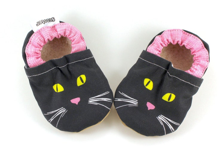 shoes with cat faces on them