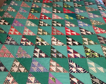 Bold vintage flying geese quilt top with some feed sack fabric newly quilted