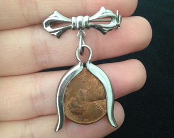 vintage penny holding bow brooch, vintage pin