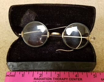 Vintage wire rimmed eye glasses with case