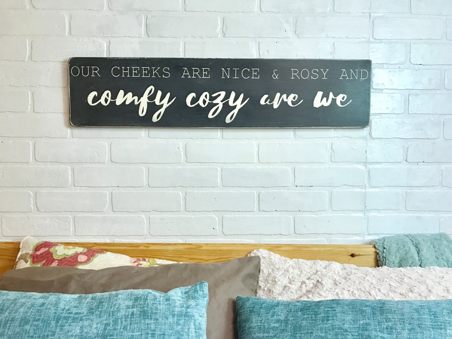 Our cheeks are nice and rosy and comfy cozy are we bedroom