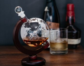 Elegant Spinning Etched Globe Whiskey Decanter with Antique Warplane and Wood Stand - 650ml
