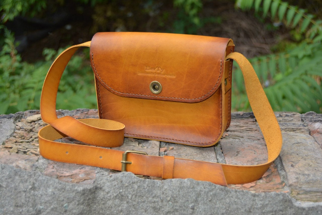 leather crossbody bag with wide strap