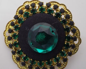 Button brooch and rhinestones