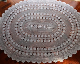 Vintage oval white crocheted tablecloth in excellent condition. Proceeds to charity VACD Ltd