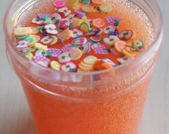 Tutti fruitti clear slime with clay fruit on top (Scented)