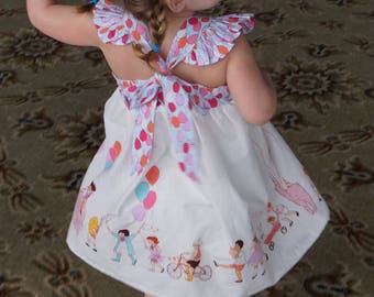 The MAISE B I R T H D A Y Dress in Sarah Jane Children at Play Fabric; Flutter sleeve; Tie Bow Back