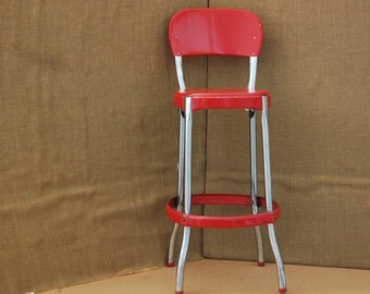 Vintage Industrial Red 1950's Cosco Stool with original paint, original cosco label on bottom, original leg caps, very solid, great patina