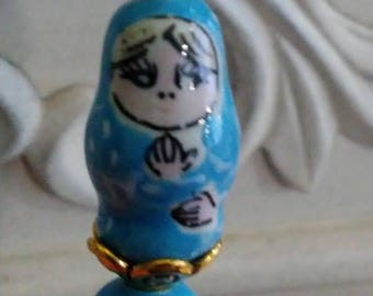 Lapel Pin or Hat Pin 3 inch gold like with a Tiny Blue Russian Nesting Doll ceramic bead