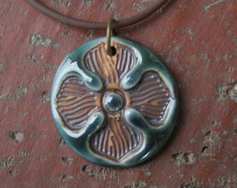 Single Flower on Copper Teal Porcelain Pendant