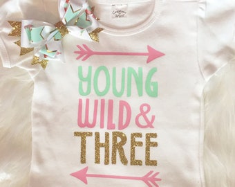 Young wild and three shirt and BOW.