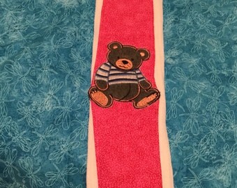 Hot pink baby burp cloths made with diapers.