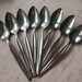 A Collection of Eight Vintage Silverplate Wm Rogers Serrated Grapefruit Citrus Spoons, Lines Pattern