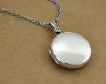 sterling silver round locket necklace. simple everyday wear. photo locket. gift for her. 925 sterling silver round locket necklace.